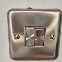 Brushed chrome light switch